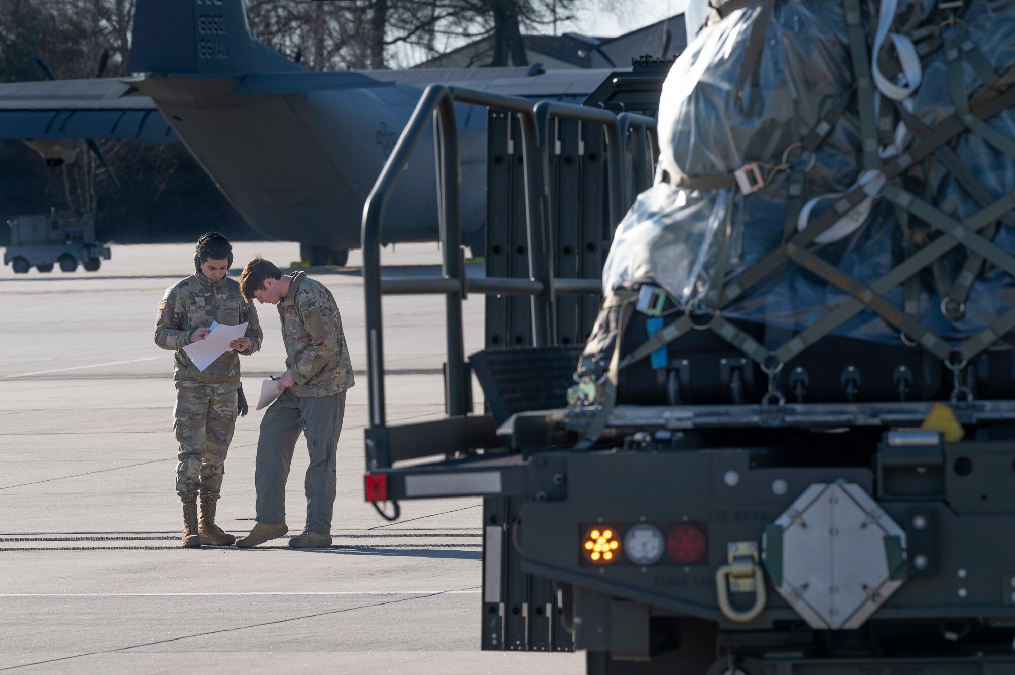 U.S. Air Force Airmen from the 86th Airlift Wing prepare to load a C-130J Super Hercules aircraft at Ramstein Air Base, Germany, Feb. 8, 2023.