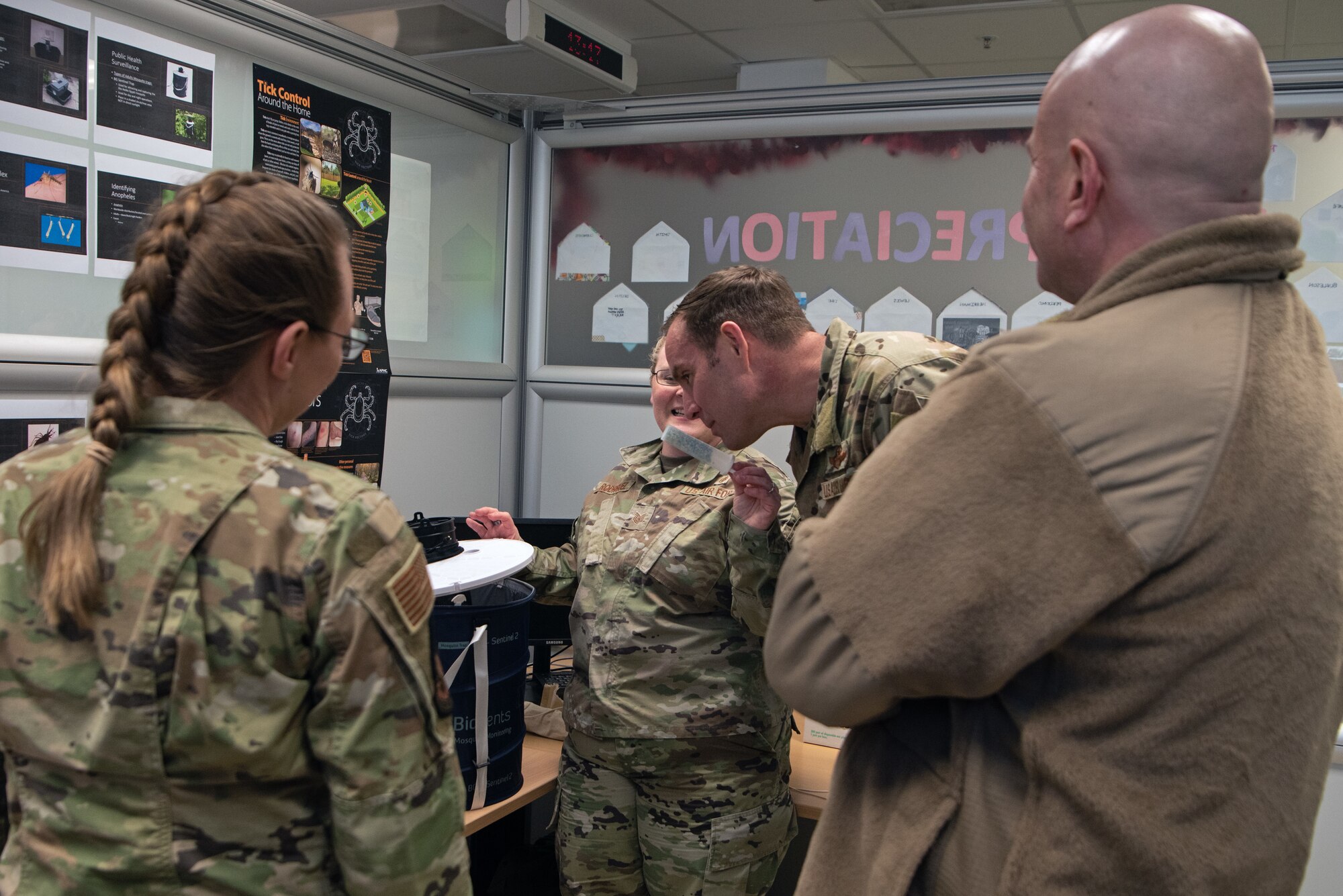 Airmen explain aspects of their jobs to wing leadership.