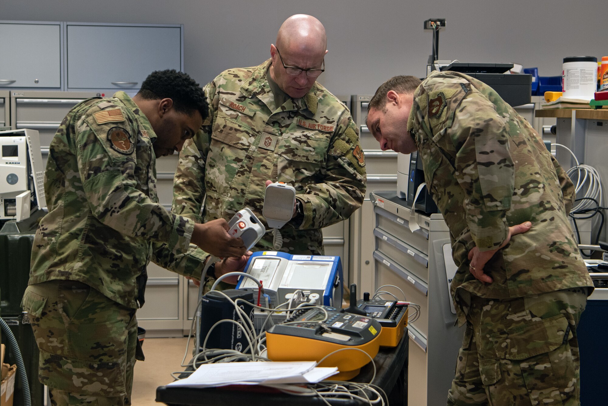 man powers on medical equipment with wing leadership