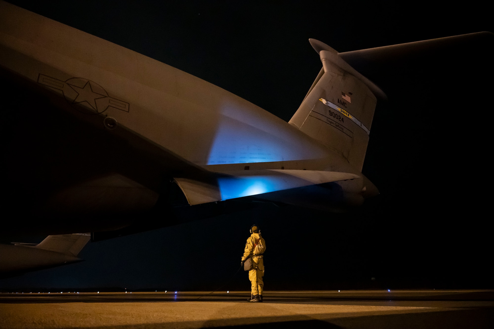 Senior Airman Daniel Baum, 436th Aircraft Maintenance Squadron crew chief, ensures the aft ramp on a C-5M Super Galaxy closes during a 436th Mission Generation Group integration event on Dover Air Force Base, Delaware, Feb. 3, 2023. This event is part of the 436th MGG monthly readiness exercises that test the ability to perform job tasks in contested environments. (U.S. Air Force photo by Staff Sgt. Marco A. Gomez)