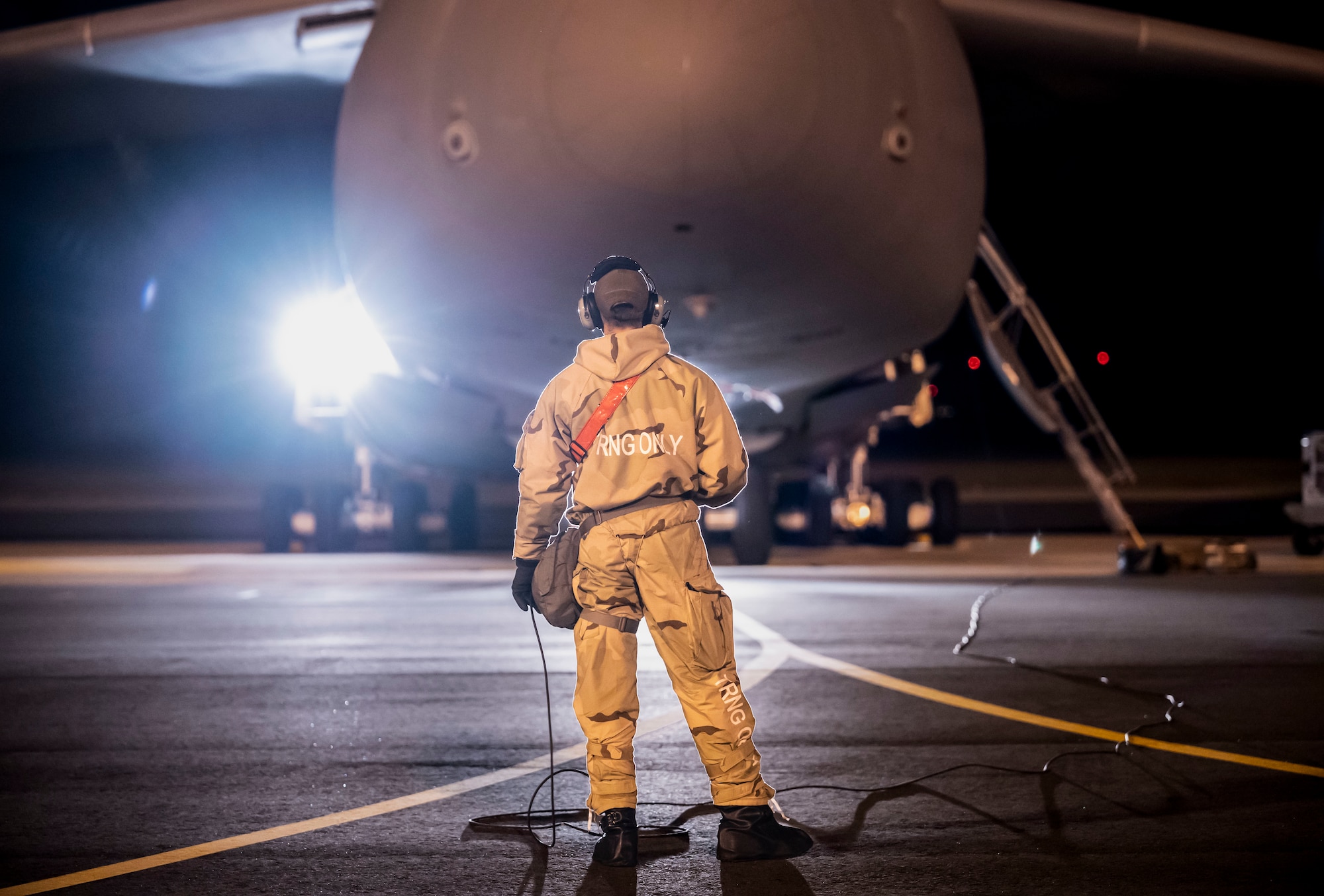 Senior Airman Daniel Baum, 436th Aircraft Maintenance Squadron crew chief, inspects main landing gear and nose taxi lights on a C-5M Super Galaxy during a 436th Mission Generation Group integration event on Dover Air Force Base, Delaware, Feb. 3, 2023. This event is part of the 436th MGG monthly readiness exercises that test the ability to perform job tasks in contested environments. (U.S. Air Force photo by Staff Sgt. Marco A. Gomez)