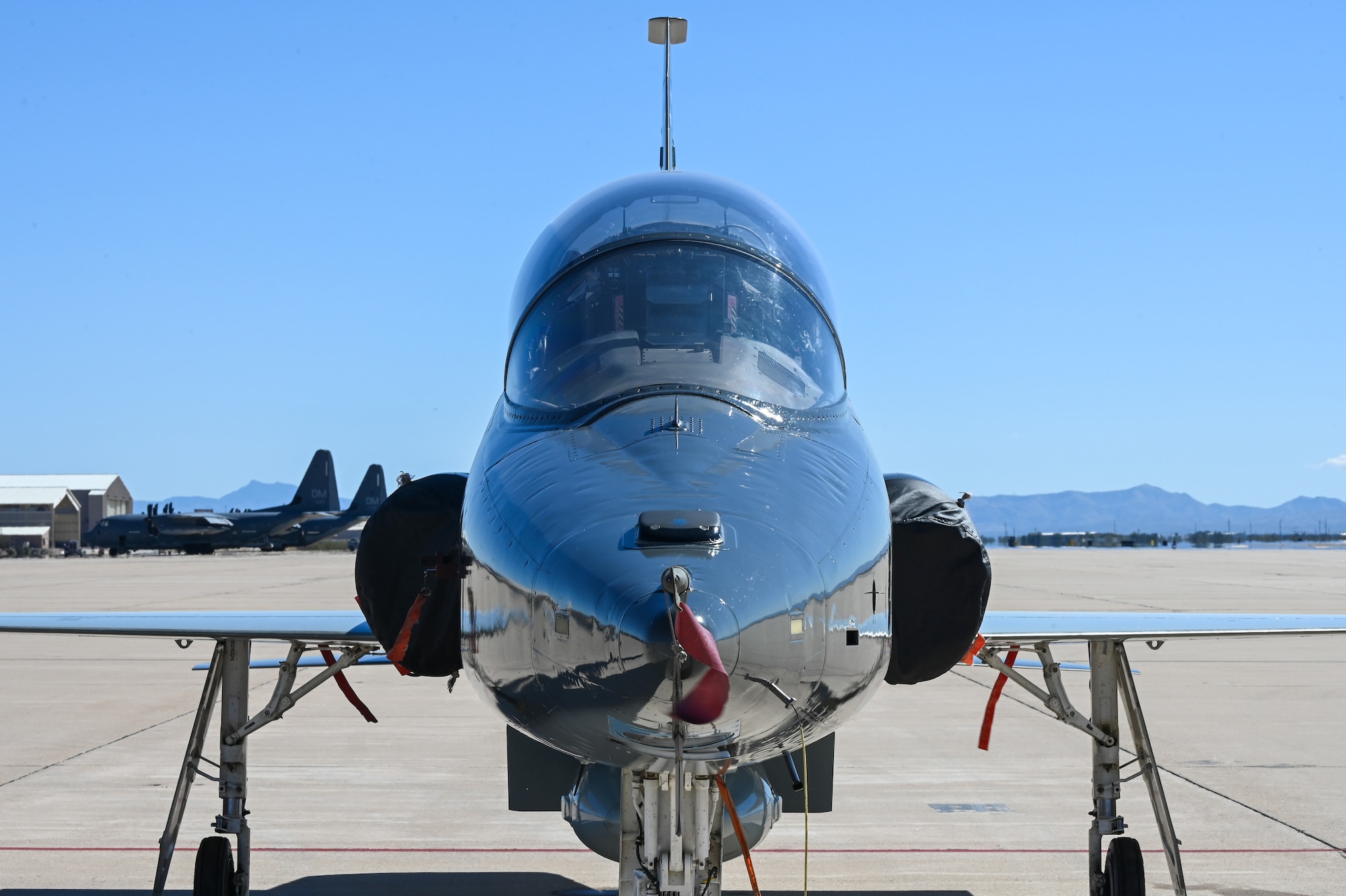 A photo of a T-38 Talon sitting on the flightline.