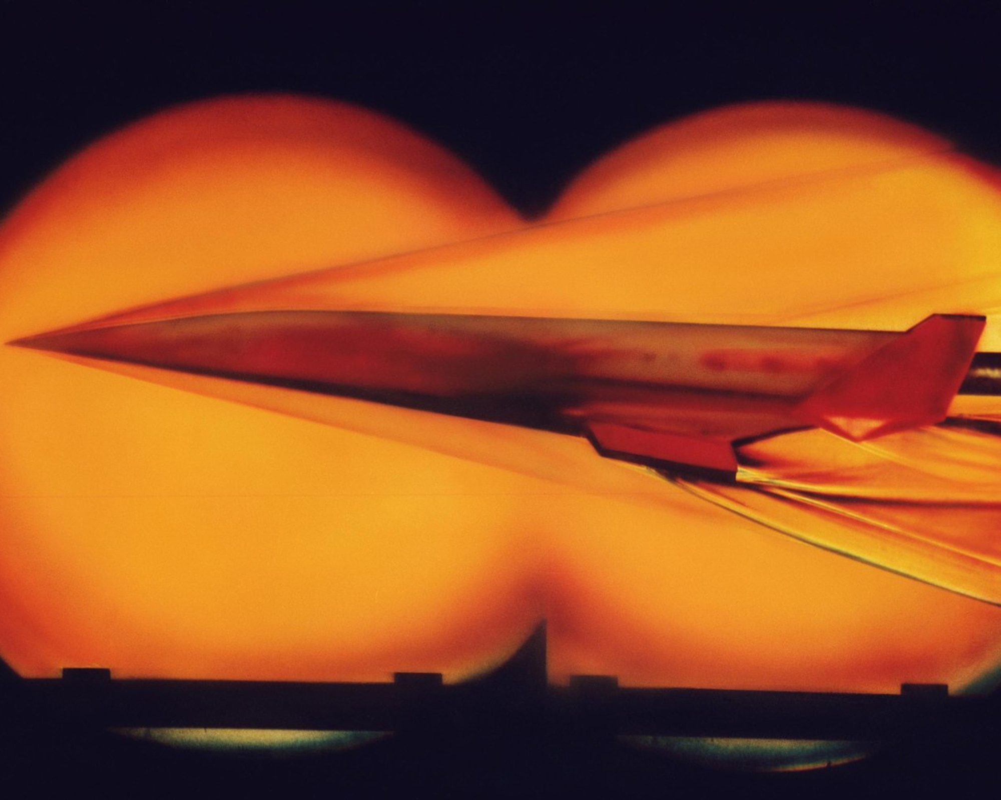A model of a hypersonic vehicle is tested in a wind tunnel at the NASA Langley Research Center in Virginia Dec. 10, 2009. A new graduate certificate program in hypersonic flight is now offered by the Air Force Institute of Technology, designed to produce technical professionals who can understand, evaluate and communicate the unique complexities of the hypersonic flight environment. (Photo By NASA Langley Research Center)
