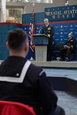 Rear Adm. Pete Garvin, commander, Naval Education and Training Command (NETC), delivers opening remarks for the Military Instructor of the Year 2022 awards ceremony at the National Naval Aviation Museum onboard Naval Air Station Pensacola, February 10, 2023. NETC’s mission is to recruit, train and deliver those who serve our nation, taking them from street-to-fleet by transforming civilians into highly skilled, operational and combat ready warfighters. (United States Navy photo by Mass Communication Specialist 2nd Class Zachary Melvin)