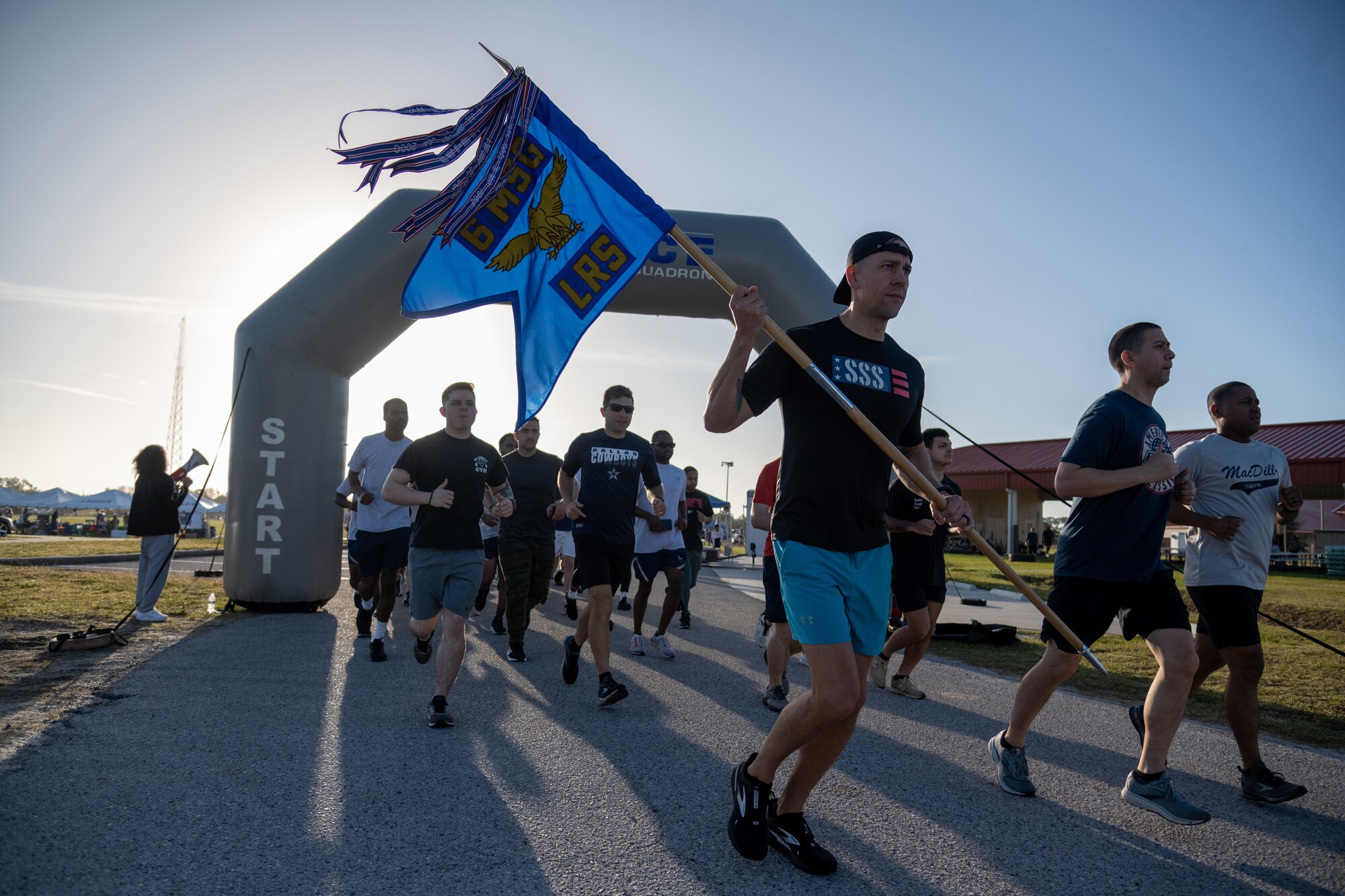 The event brought units from across the installation together to compete in various events including a formation run, golf, basketball, volleyball, softball, tug o’ war, football, cornhole, kickball and dodgeball. (U.S. Air Force photo by Airman 1st Class Zachary Foster)