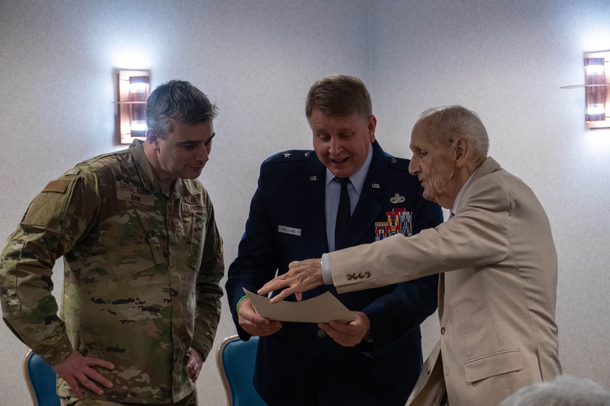 Photo of Airmen speaking together