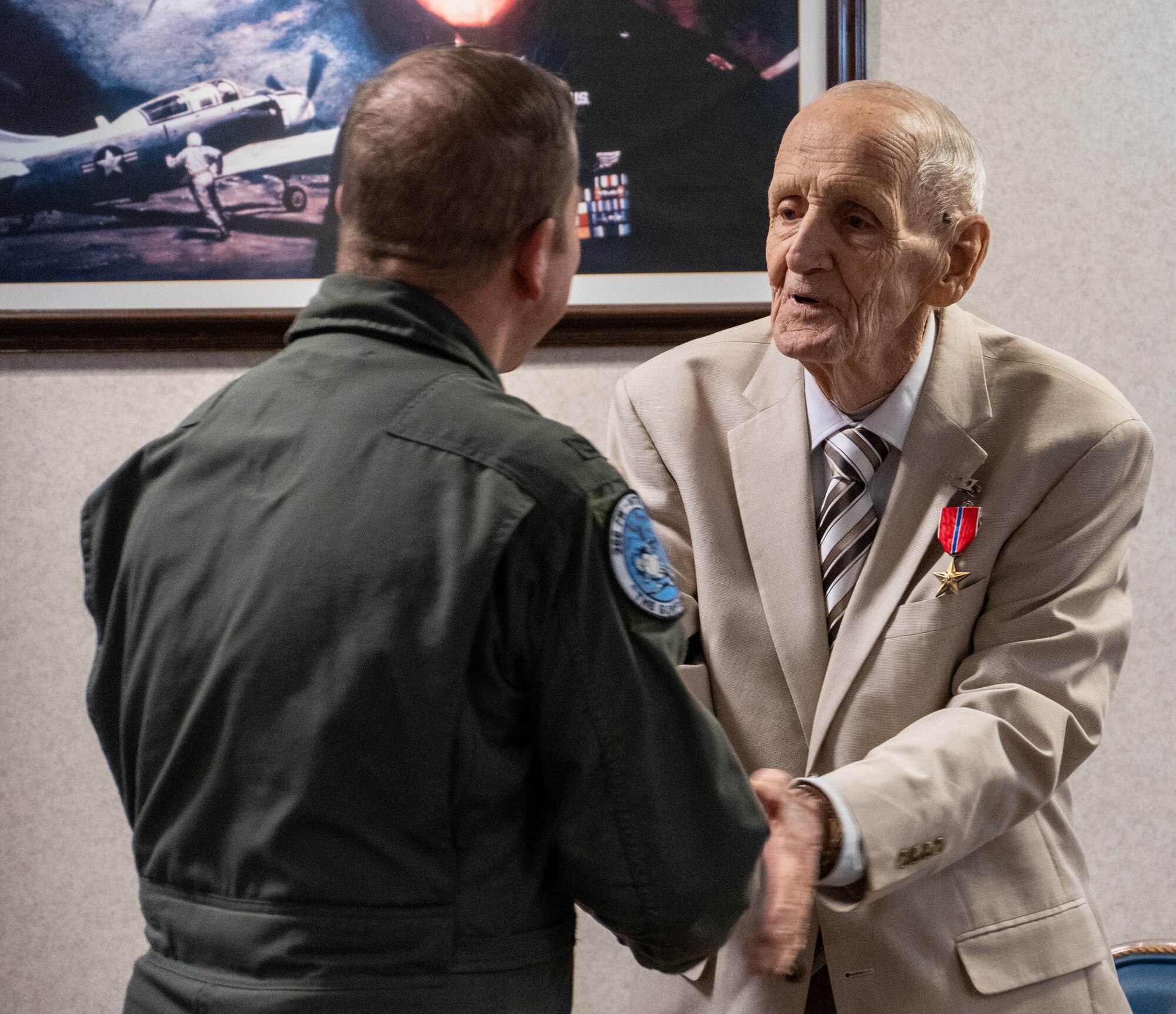 Photo of two men shaking hands