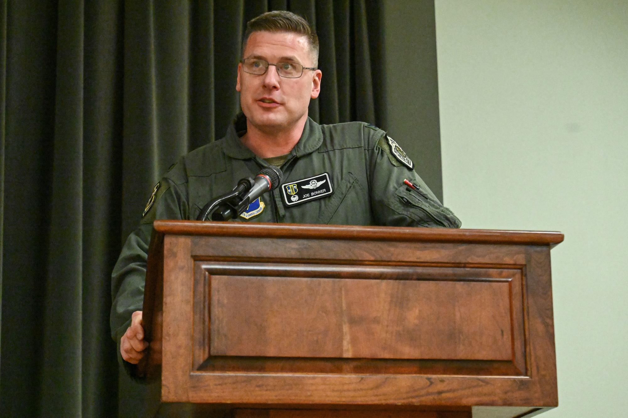 Man in uniform gives a speech.