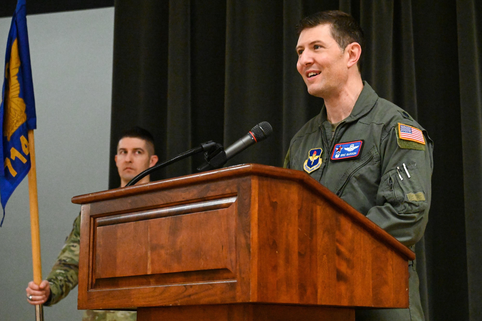 Man in uniform gives a speech.