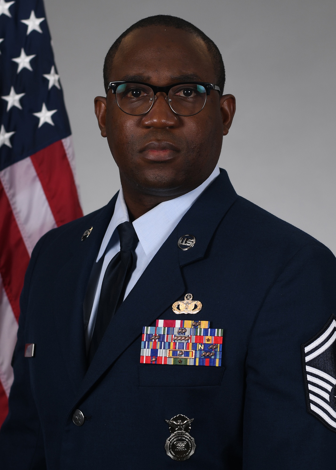 Man in uniform wearing glasses