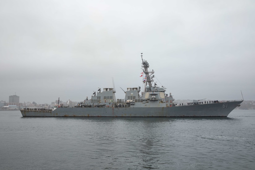 A large ship sails in the ocean.