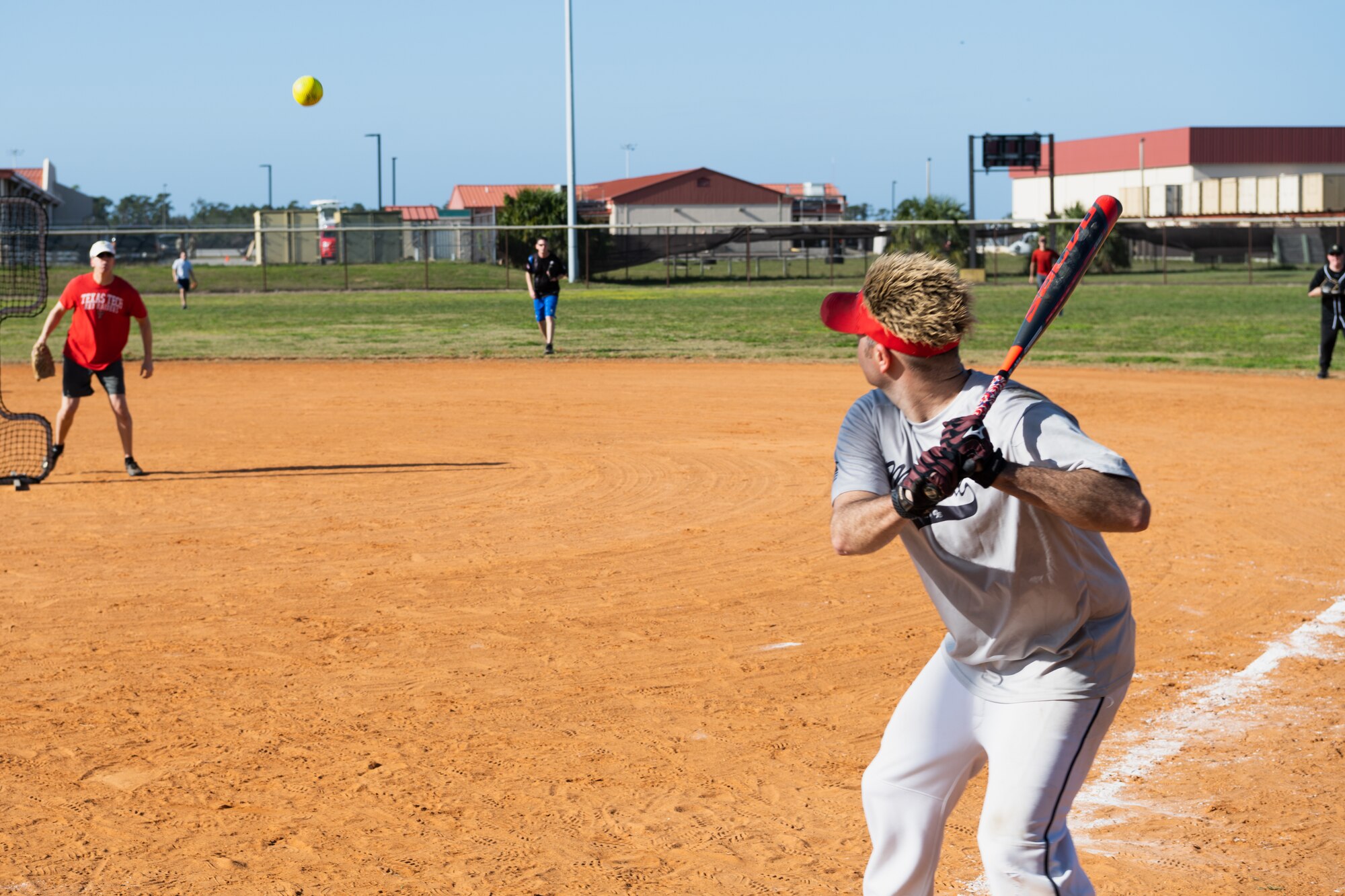 This Wingman Day included sports, competitions, and the physical domain of resilience. The sports competitions included a formation run, golf, softball, volleyball, cornhole, relay races, kickball, and more. (U.S. Air Force photo by Airman 1st Class Derrick Bole)