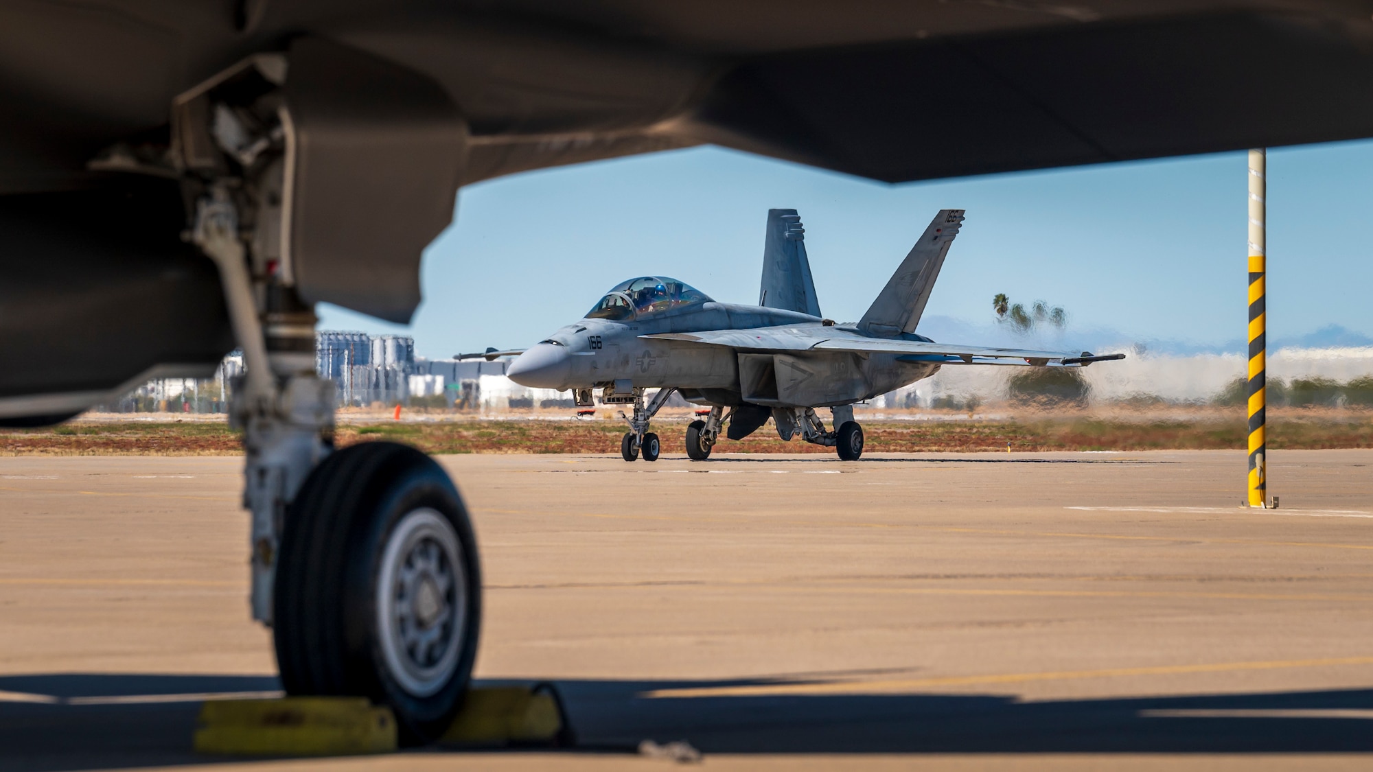 A U.S. Navy F/A-18E Super Hornet assigned to the “Flying Eagles” of Strike Fighter Squadron (VFA) 122, Lemoore, California, taxis at Luke Air Force Base, Arizona, Feb. 7, 2023.