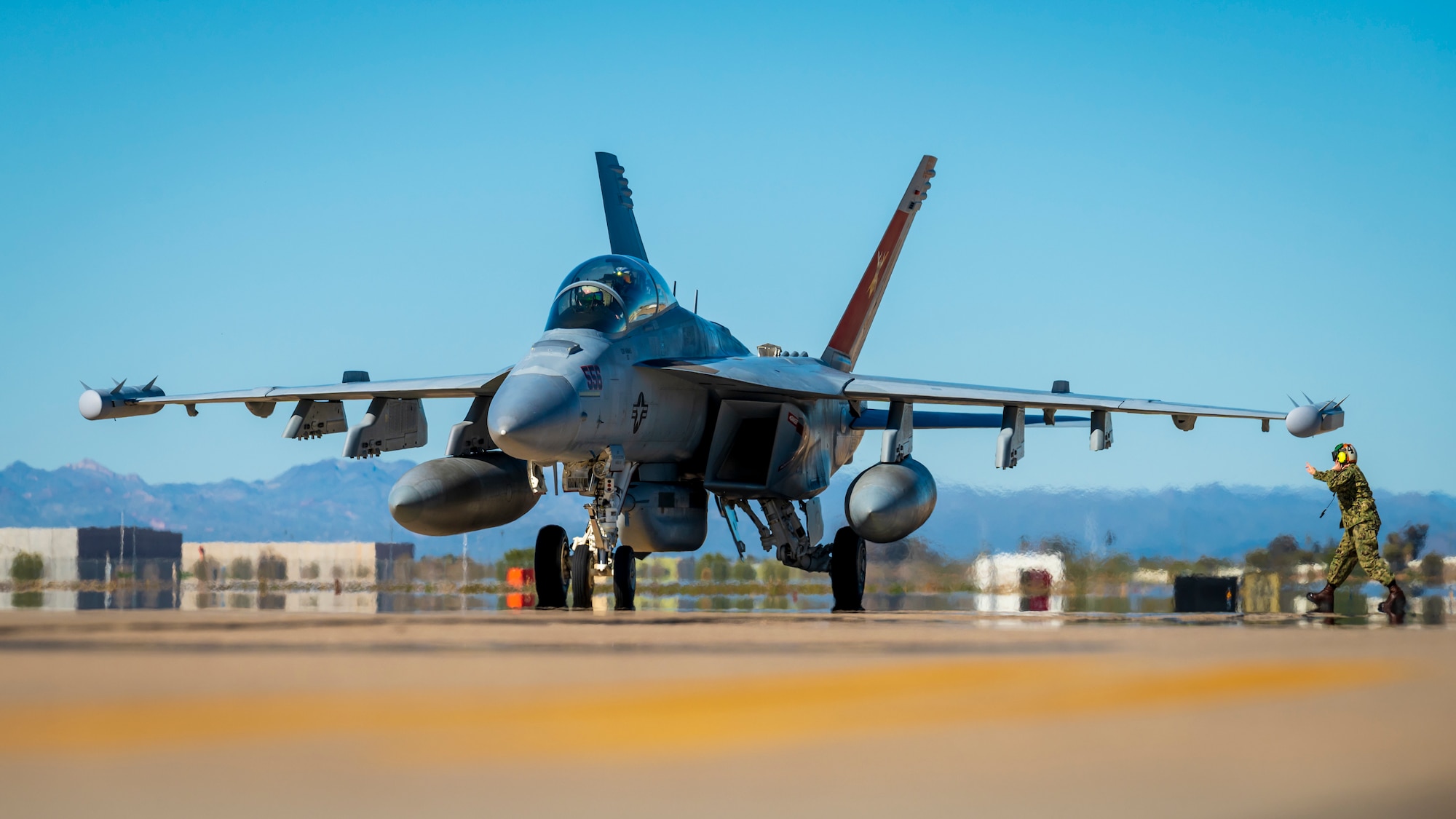 U.S. Navy ADC Tabitha Bledsoe catches an EA-18G Growler assigned to the “Vikings” of Electronic Attack Squadron (VAQ) 129, Oak Harbor, Washington, at Luke Air Force Base, Arizona, Feb. 7, 2023.