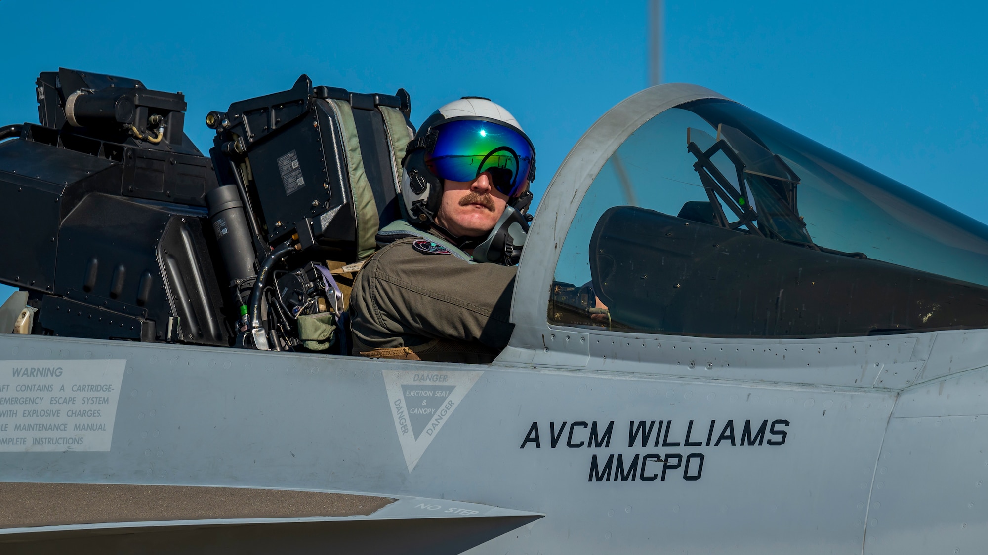 U.S. Navy Lt. Slawomir Glownia, EA-18G Growler VAQ 129 pilot, sits inside of an EA-18G Growler assigned to the “Vikings” of Electronic Attack Squadron (VAQ) 129, Oak Harbor, Washington, at Luke Air Force Base, Arizona, Feb. 7, 2023.