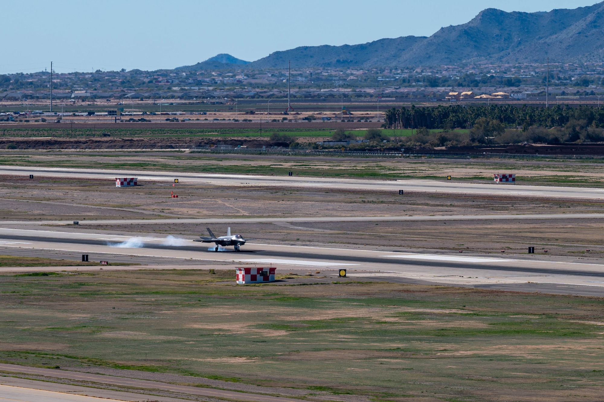 An F-35C Lightning II assigned to the "Warhawks" Strike Fighter Squadron (VFA) 97 out of Naval Air Station (NAS) Lemoore, California, lands at Luke Air Force Base, Arizona, Feb. 7, 2023.