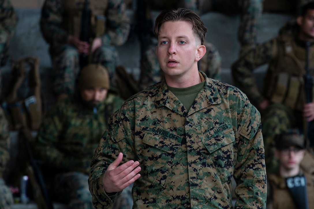 U.S. Marine Corps Cpl. Denis Gavriloff instructs Marines during a class before they enter Hathcock Range on Marine Corps Air Station Miramar, Jan. 30, 2023. Gavriloff, a native of Bothell, Washington, is a marksmanship coach with Headquarters and Headquarters Squadron, MCAS Miramar. Hathcock Range uses an innovative Location of Miss and Hit low-bar system, which can track shots on the target within a deviation of 17 millimeters. (U.S. Marine Corps Photo by Lance Cpl. Jackson Rush)