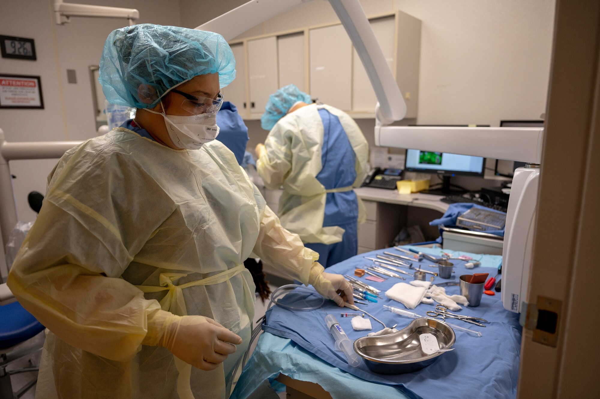An Airman performs medical duties