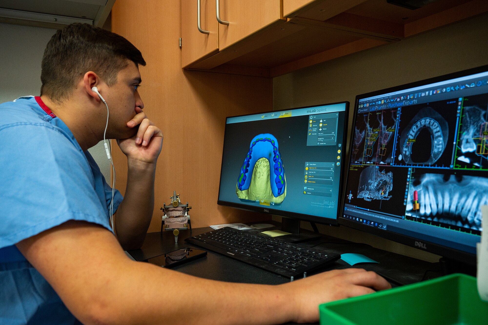An Airman performs medical duties