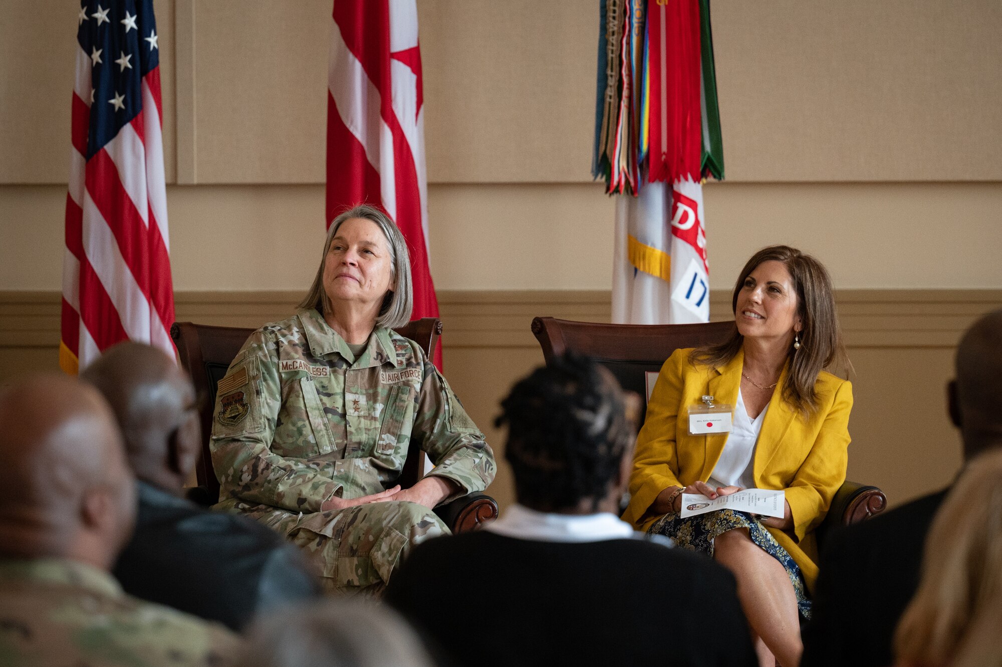 U.S. Air Force Maj. Gen. Sherrie L. McCandless, left, commanding general, District of Columbia National Guard, and Kelly Hokanson, spouse of the chief of the National Guard Bureau, watch a video at the District of Columbia Armory in Washington Feb. 9, 2023. Hokanson and McCandless recognized the DCNG Family Readiness Program for supporting more than 26,000 Soldiers and Airmen during the Capitol Response.