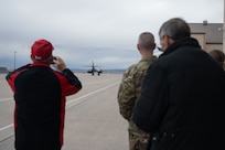 Community and business leaders from the greater Cheyenne area participating in a civic leader tour hosted by the 90th Missile Wing at F.E. Warren Air Force Base, Wyoming, watch as a B-1B Lancer taxis prior to take off as part of the group’s visit to Ellsworth AFB, South Dakota, Feb. 8, 2023.