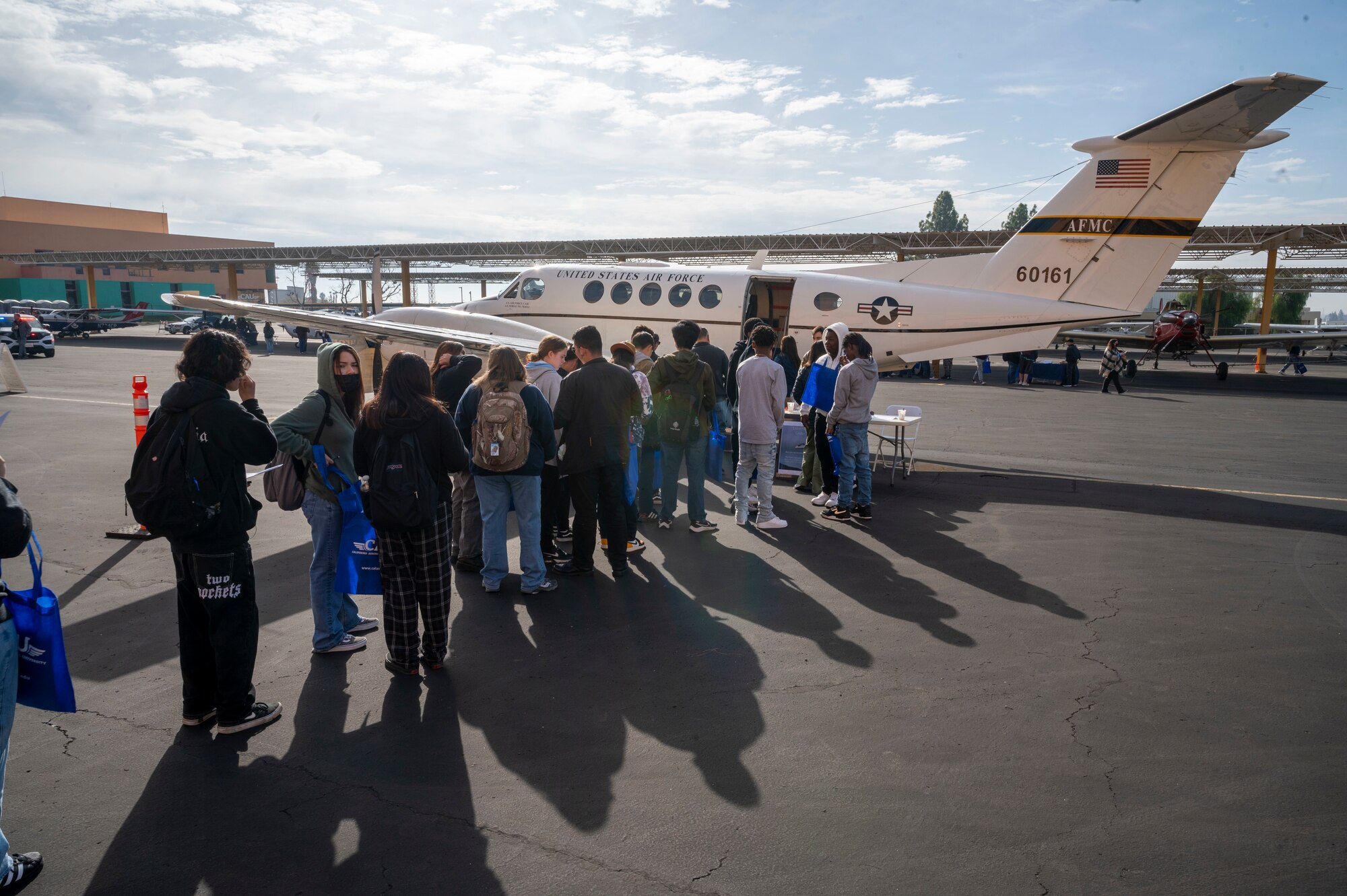 Hosted by the 412th Operations Group representing Edwards Air Force Base, students visiting the California Aeronautical University Aviation Career Day got the chance to experience being a Test Pilot and a Flight Test Engineer. Students got to go inside of the C-12 Huron which was flown by the 412th Operations Group to get to the event.