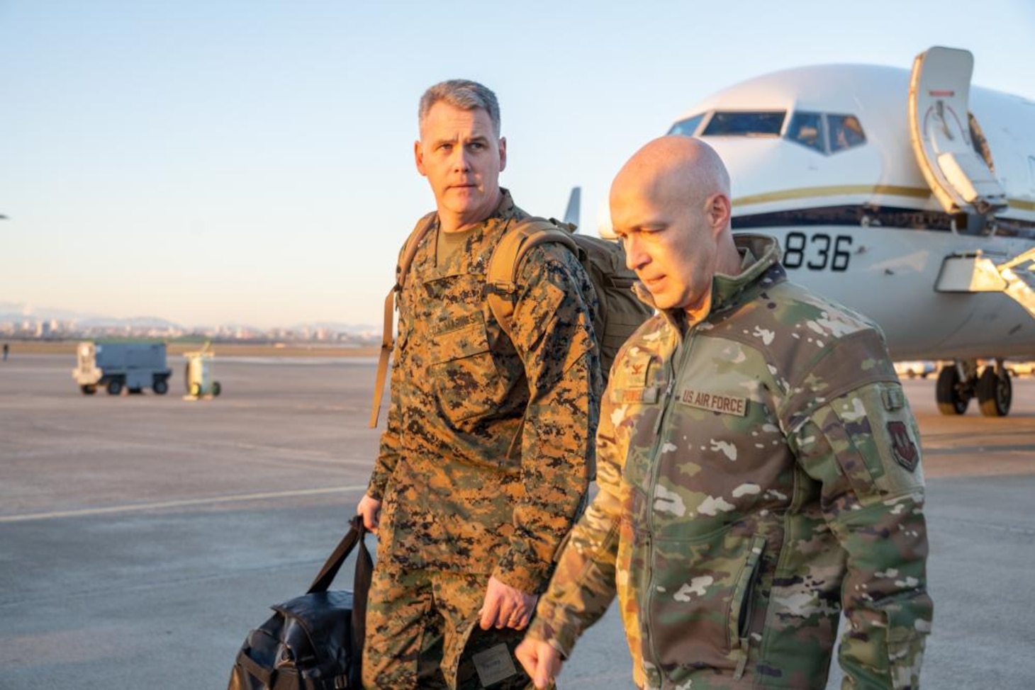 U.S. Marine Corps Brig. Gen. Andrew Priddy, commanding general of 2nd Marine Expeditionary Brigade and deputy commanding general of II Marine Expeditionary Force, left, walks with Col. Calvin Powell, 39th Air Base Wing commander, right, after arriving at Incirlik Air Base, Türkiye, Feb 9, 2023. The U.S. Marines and U.S. Navy personnel were tasked to assist with leading the response force following a series of earthquakes that struck central-southern Türkiye on Feb 6, 2023. As a fellow NATO ally, the U.S. Government mobilized personnel to assist in Türkiye in their response efforts.