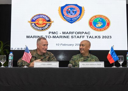 U.S. Marine Corps Lt. Gen. William M. Jurney, left, commander, U.S. Marine Corps Forces, Pacific (MARFORPAC), speaks with Philippine Marine Corps Maj. Gen. Charlton Sean M. Gaerlan, commandant, Philippine Marine Corps (PMC), during the PMC-MARFORPAC Staff Talks, at the Citystate Asturias Hotel in Puerto Princesa, Palawan, Philippines, Feb. 10, 2023. The PMC-MARFORPAC Staff Talks serve to strengthen the relationship between MARFORPAC and the Philippine Marine Corps by providing the opportunity to align goals and objectives and collaborate on common interests through bilateral discussions and engagements. (U.S. Marine Corps photo by Sgt. Danny Nateras)