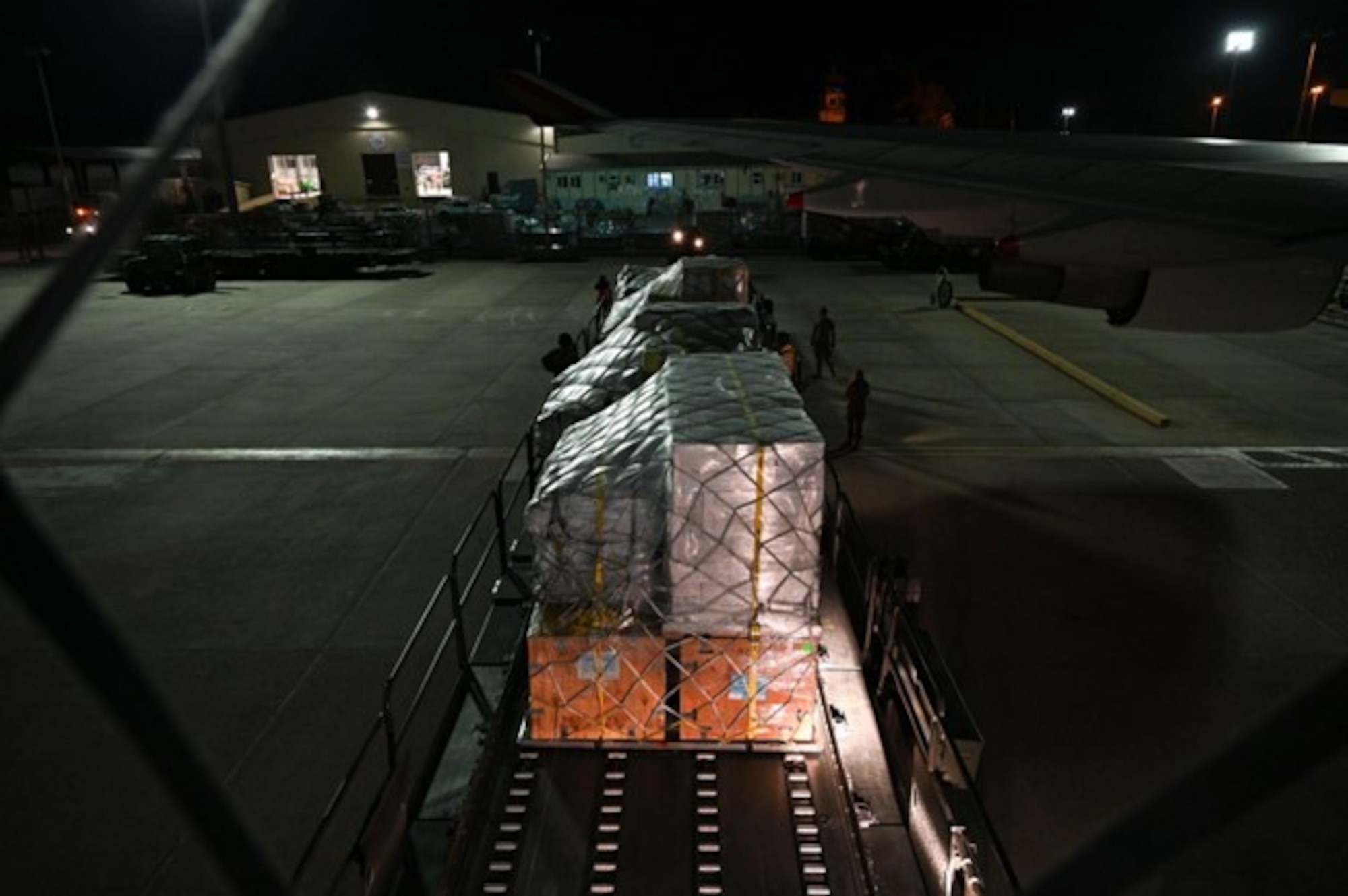 Members from the 728th Air Mobility Squadron assist humanitarian relief efforts by offloading a chartered 747-400F containing a 52-bed emergency field hospital tent from U.S. non-government organization Samaritan's Purse at Incirlik Air Base, Türkiye, Feb. 10, 2023. The hospital components will be transported commercially to Antakya, Türkiye to give aid to those in need following the earthquakes that struck Türkiye on Feb. 6. The U.S. military is working in support of U.S. Agency for International Development, the government of Türkiye and our Allies and partners to provide relief to the people of Türkiye. The 39th Air Base Wing is committed to facilitating disaster relief operations to rapidly reduce the suffering of the victims of this disaster. (U.S. Air Force photo by Staff Sgt. Gabrielle Winn)