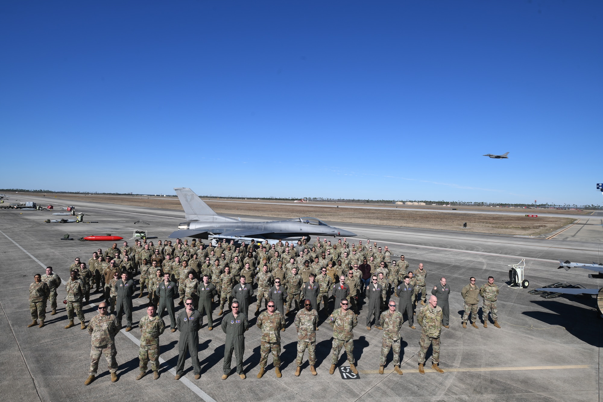 An image of U.S. Air Force Airmen, with the 177th Fighter Wing of the New Jersey Air National Guard, posing for a group photo at Tyndall Air Force Base, Fla.