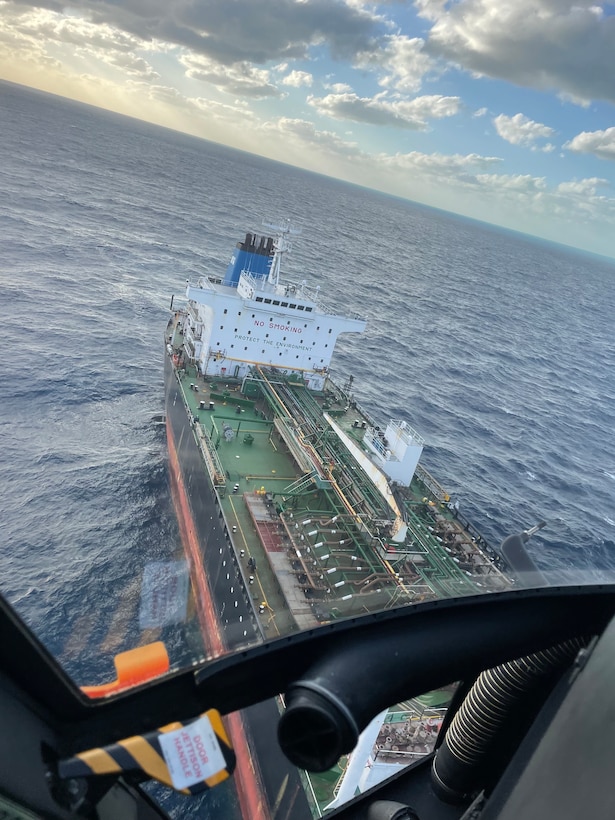 A Coast Guard MH-65 Dolphin helicopter crew medevaced a 27-year-old man from a tanker vessel approximately 50 miles southwest of Key West, Fla., Feb. 12, 2023. The man, who was suffering from severe chest pains, was transferred to Lower Keys Medical Center for further medical evaluation. (U.S. Coast Guard photo)