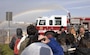 230210-N-IE405-1352 NAVAL SUPPORT ACTIVITY NAPLES, Italy (Feb. 10, 2023) Personnel from U.S. Naval Support Activity (NSA) Naples Fire Department explains a demonstration to local Italian students during a community relations event onboard U.S. Naval Support Activity (NSA) Naples in Capodichino, Italy, Feb. 10, 2023. NSA Naples is an operational ashore base that enables U.S., allied, and partner nation forces to be where they are needed, when they are needed to ensure and stability in the European, African, and Central Command areas of responsibility. (U.S. Navy photo by Mass Communication Specialist)