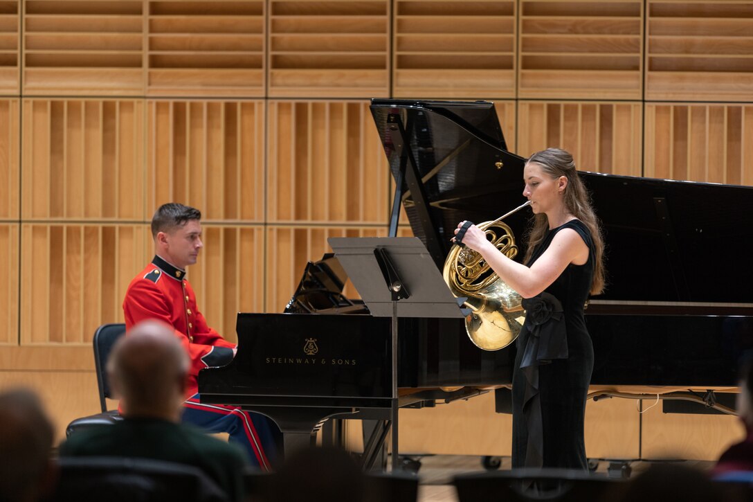 French Horn Player Julianna Hollenbach performs Richard Strauss' Horn Concerto No. 1 in E-flat, Opus 11 during the 2023 Marine Band Concerto Competition Finals.