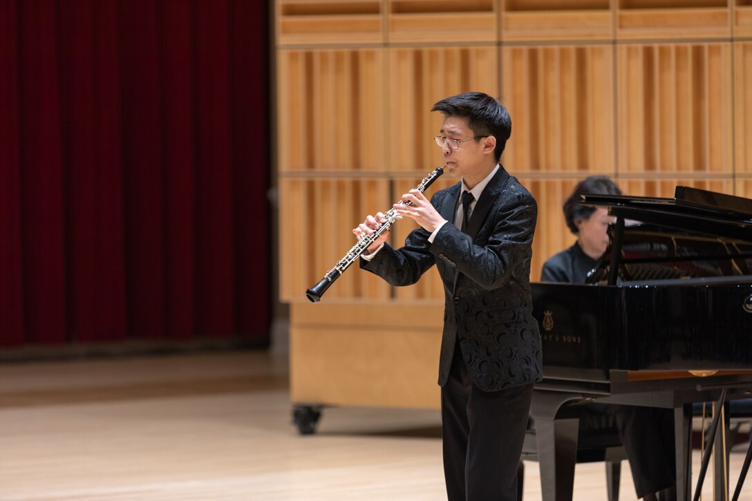 Oboist Kyle Cho performs Nicolai Rimsky-Korsakov's Allegro from Variations on a Theme by Glinka during the 2023 Marine Band Concerto Competition Finals. He was the first place winner of the competition.