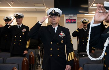 NEWPORT, R.I. (Feb. 2, 2023) Command Master Chief David Martinez, deputy director, U.S. Navy Senior Enlisted Academy (SEA), passes through sideboys during the SEA change of charge ceremony, Feb. 2, 2023. Martinez relieved Command Master Chief Baron Randle as the SEA director. The SEA provides senior enlisted leaders with education and training in communication skills, leadership and management, national security affairs, Navy programs and physical fitness. (U.S. Navy photo by Mass Communication Specialist 2nd Class Derien C. Luce)