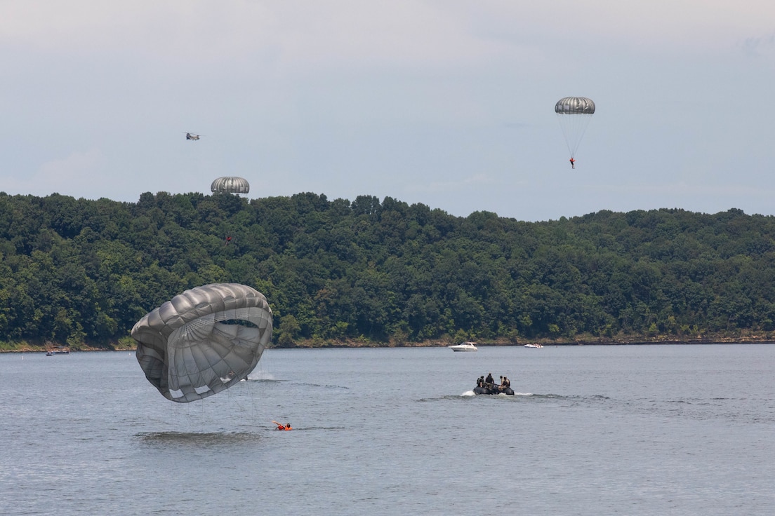 Soldiers of the 20th Special Forces Group Military Intelligence Company (MICO) conducted a water jump at Green River Lake near Campbellsville, KY, Aug. 6, 2022. The jump was conducted to enhance the company’s proficiency in conducting airborne operations that require a water landing. (U.S. Army National Guard photo by Spc. Caleb Sooter)