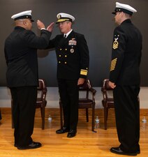 NEWPORT, R.I. (Feb. 2, 2023) Rear Adm. Pete Garvin, commander, Naval Education and Training Command, center, presides as Command Master Chief Baron Randle, left, is relieved by Command Master Chief David Martinez, right, as the U.S. Navy’s Senior Enlisted Academy director during their change of charge ceremony, Feb. 2, 2023. The SEA provides senior enlisted leaders with education and training in communication skills, leadership and management, national security affairs, Navy programs and physical fitness. (U.S. Navy photo by Mass Communication Specialist 2nd Class Derien C. Luce)