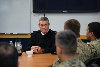 NEWPORT, R.I. (Feb. 2, 2023) Rear Adm. Pete Garvin, commander, Naval Education and Training Command, speaks with Surface Warfare Schools Command (SWSC) staff at Naval Station (NAVSTA) Newport, Feb. 2, 2023. Garvin visited NAVSTA Newport to serve as the presiding officer for the U.S. Navy Senior Enlisted Academy’s change of charge ceremony and to engage with the staff and students of SWSC, Officer Training Command Newport, and Naval Leadership and Ethics Center. (U.S. Navy photo by Mass Communication Specialist 2nd Class Derien C. Luce)