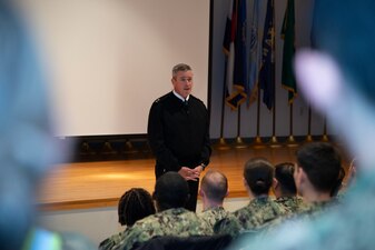 NEWPORT, R.I. (Feb. 2, 2023) Rear Adm. Pete Garvin, commander, Naval Education and Training Command, speaks with students from the Officer Development Course at Officer Training Command Newport (OTCN) on Naval Station (NAVSTA) Newport, Feb. 2, 2023. Garvin visited NAVSTA Newport to serve as the presiding officer for the U.S. Navy Senior Enlisted Academy’s change of charge ceremony and to engage with the staff and students of Surface Warfare Schools Command, OTCN, and Naval Leadership and Ethics Center. (U.S. Navy photo by Mass Communication Specialist 2nd Class Derien C. Luce)