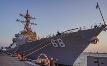 Guided-missile destroyer USS The Sullivans (DDG 68), pulls into Manama, Bahrain, Nov. 20.