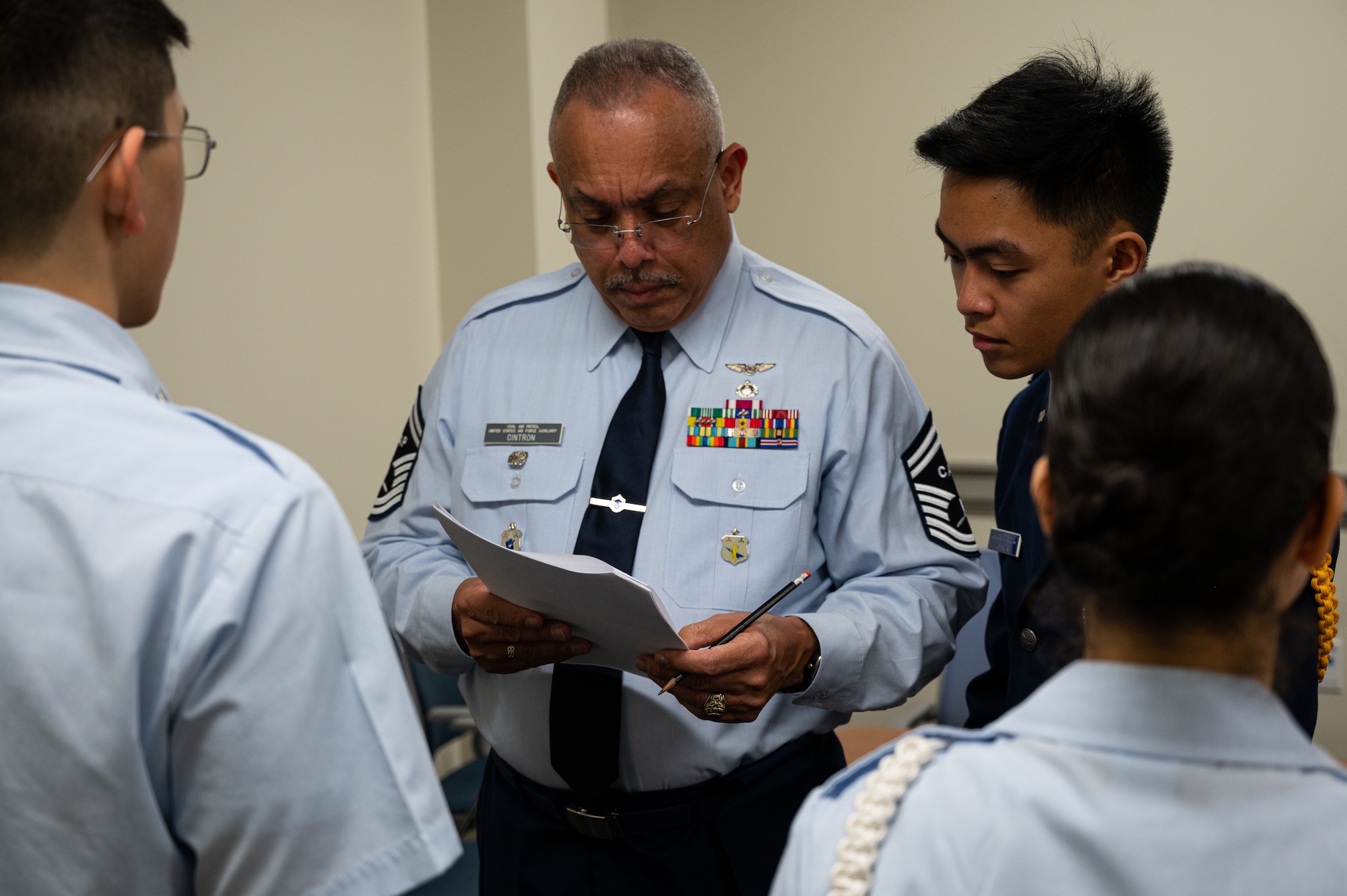 New Jersey Civil Air Patrol cadets participate in a uniform inspection at Joint Base McGuire-Dix-Lakehurst, N.J., Feb. 11, 2023. The New Jersey Wing of CAP hosted their cadet competition to determine which team moves on to the North East Regional competition. Cadets competed in a series of challenges including uniform inspections, academic tests and squad drill. (U.S. Air Force photo by Senior Airman Sergio Avalos)
