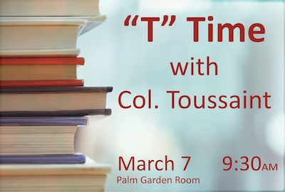 Picture of a stack of books with the Time and Location information for the T Time event