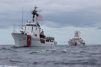 The crew of the Coast Guard Cutter Active, a 210-foot Medium Endurance Cutter homeported in Port Angeles, Wash., conducts an at sea refueling of the Coast Guard Cutter Oliver Berry, a fast response cutter homeported in Honolulu, in the Eastern Pacific Ocean, Sept. 17, 2017.