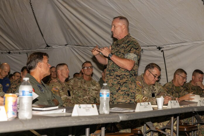 U.S. Marine Corps Lt. Gen. William M. Jurney, commander, U.S. Marine Corps Forces, Pacific, gives a brief on the site of an expeditionary command and control node training exercise at Camp H.M. Smith, Hawaii, Feb. 7, 2023. Forces from I Marine Expeditionary Force and III MEF established a Multi-Function Air Operations Center and Multi-Domain Operations Center during the exercise to synchronize all-domain effects across the Indo-Pacific region for the Joint Force and interagency partners. The C2 node, operated by Marines of MACG-38 and 3rd MAW informed and enabled the synchronization of organic, joint, and/or interagency fires – both lethal and non-lethal – across air, sea, land, space, and cyber to achieve specific, desired effects during the exercise.