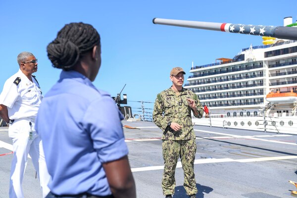 Members of the Royal Bahamian Defense Force Enlisted Corps tour the forecastle of the Arleigh Burke-class guided-missile destroyer USS Gravely (DDG 107) during a port visit to Nassau, Bahamas.