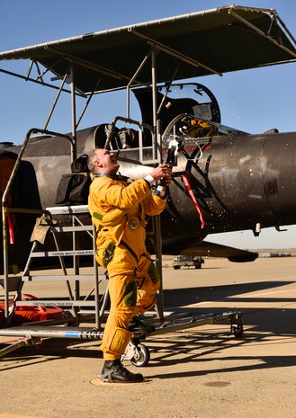 U.S. Air Force Maj. Pritt, 1st Reconnaissance Squadron U-2 Dragon Lady pilot, celebrates after his final U-2 flight Jan. 25, 2023, at Beale Air Force Base, Calif.