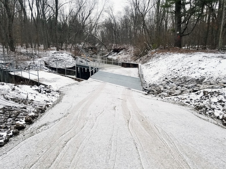 The permanent $1.67 million sea lamprey trap on the East Branch Au Gres River in Iosco County, Michigan is pictured in its final day of construction, Jan 24, 2023. The project represents a long-standing partnership between U.S. Army Corps of Engineers, Detroit District and Great Lakes Fishery Commission to control invasive sea lampreys and protect the $7 billion Great Lakes fishery from the parasitic fish species. (U.S. Army Corps of Engineers Photo by Adam Virga)