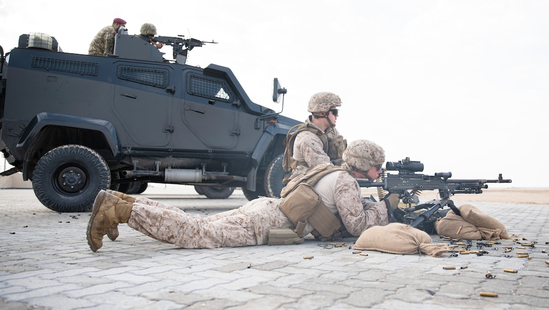 BAHRAIN (January 17, 2023) – U.S. Marines assigned to Fleet Anti-Terrorism Security Team Central Command (FASTCENT) and members of the Bahrain Defence Force participate in a live fire machine gun range as part of exercise Neon Defender 23 in Bahrain, Jan. 17. Neon Defender is an annual bilateral training event between U.S. Naval Forces Central Command and Bahrain. The exercise focuses on maritime security, installation defense, naval construction, medical response and search and rescue training.