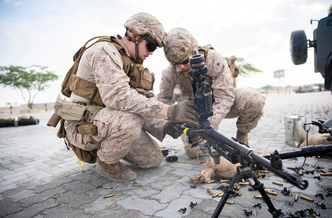 BAHRAIN (January 17, 2023) – U.S. Marines assigned to Fleet Anti-Terrorism Security Team Central Command (FASTCENT) and members of the Bahrain Defence Force participate in a live fire machine gun range as part of exercise Neon Defender 23 in Bahrain, Jan. 17. Neon Defender is an annual bilateral training event between U.S. Naval Forces Central Command and Bahrain. The exercise focuses on maritime security, installation defense, naval construction, medical response and search and rescue training.