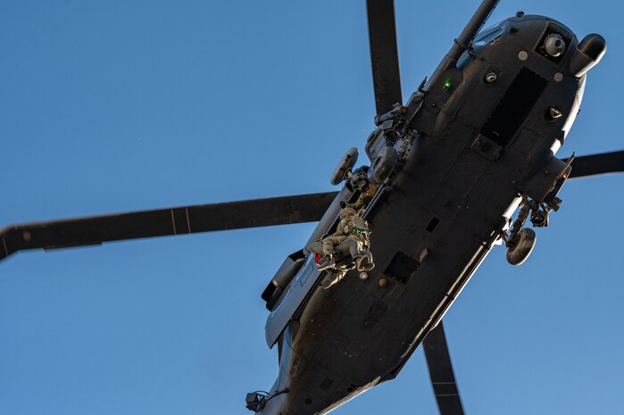 Davis-Monthan Pararescuemen are practicing a simulated rescue at Red Flag 23-1